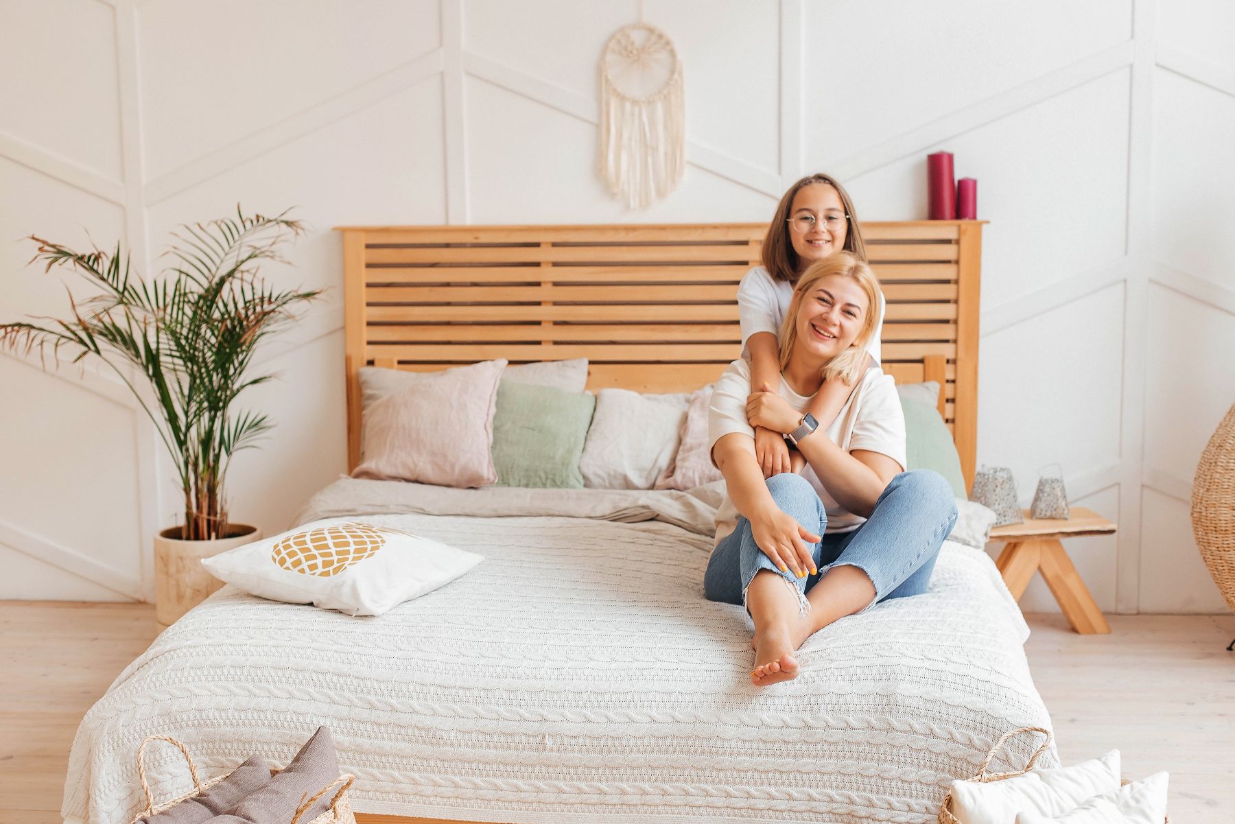 a young mother plays with her daughter having fun